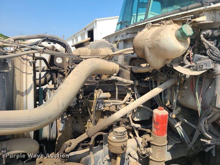 image for item LE9147 1998 Volvo WG  water truck