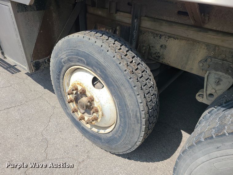 image for item LE9147 1998 Volvo WG  water truck