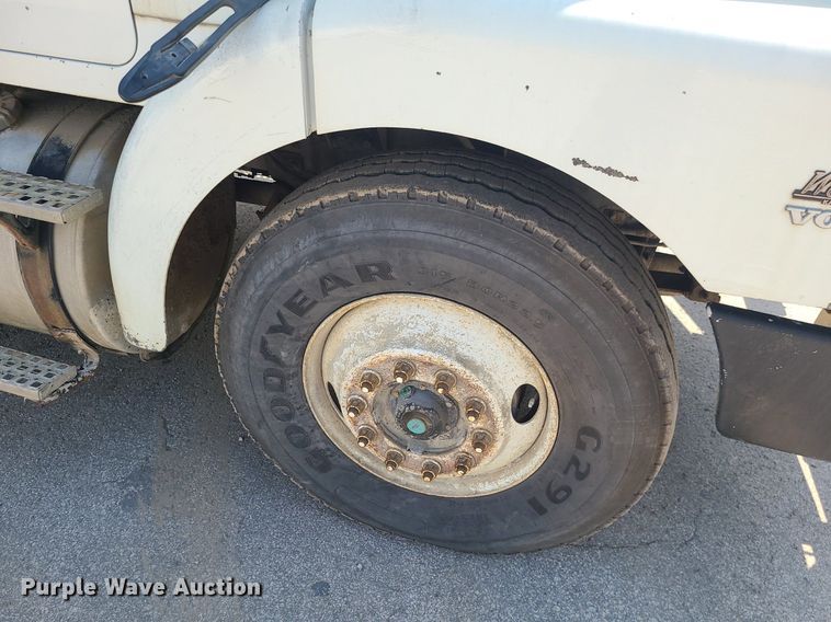 image for item LE9147 1998 Volvo WG  water truck