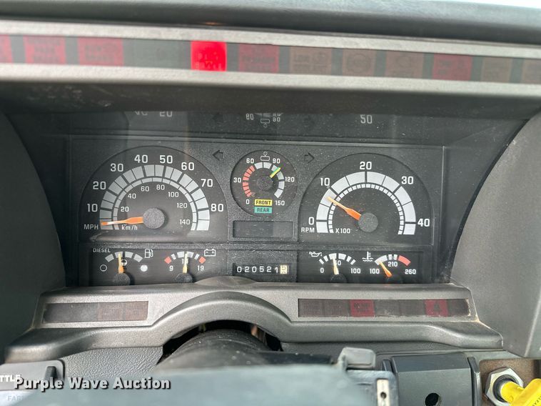 image for item OC9066 1998 GMC C7500  flatbed truck