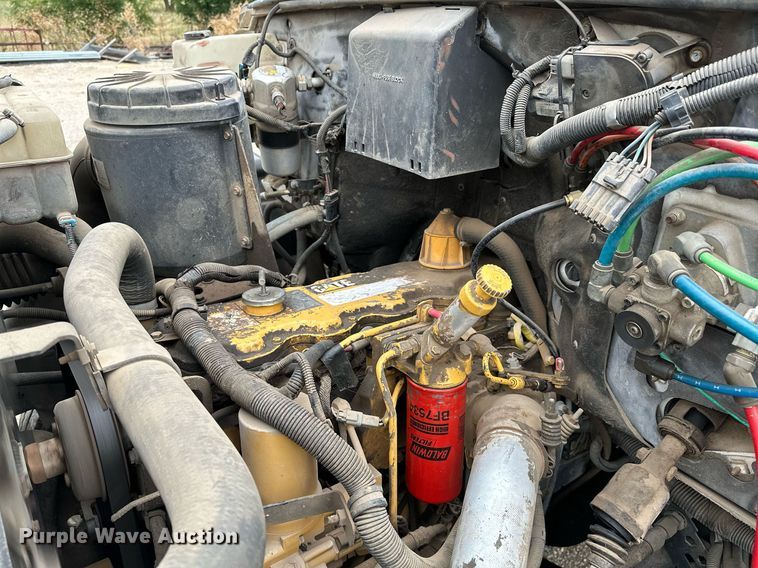 image for item OC9066 1998 GMC C7500  flatbed truck