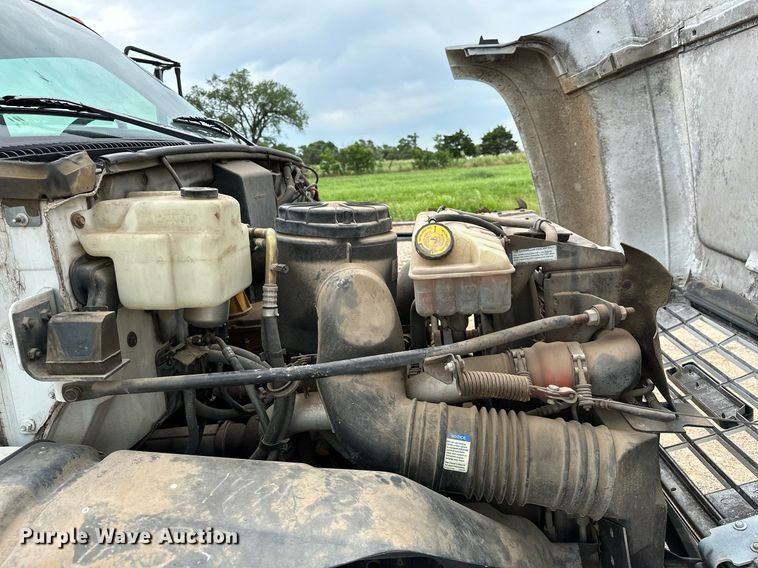 image for item OC9066 1998 GMC C7500  flatbed truck