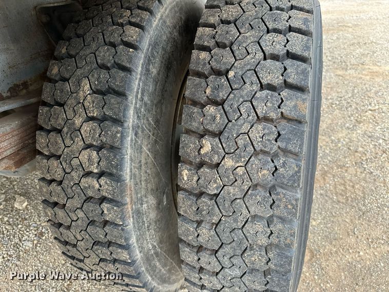 image for item OC9066 1998 GMC C7500  flatbed truck