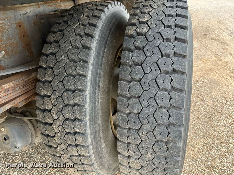 image for item OC9066 1998 GMC C7500  flatbed truck