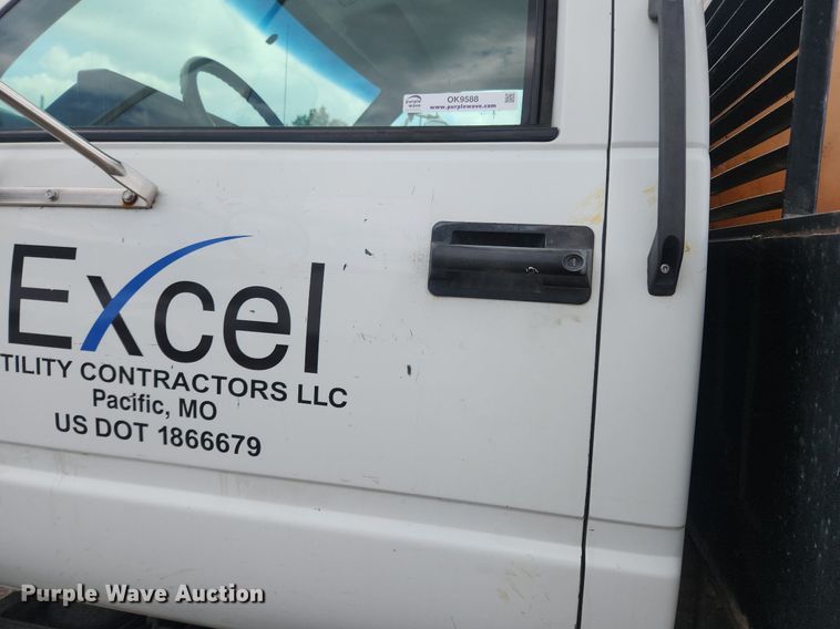 image for item OK9588 1999 GMC C7500  flatbed truck