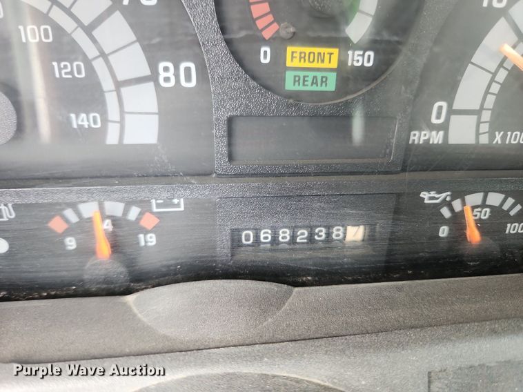 image for item OK9588 1999 GMC C7500  flatbed truck