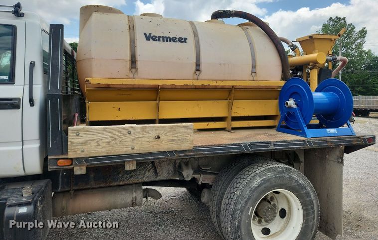 image for item OK9588 1999 GMC C7500  flatbed truck