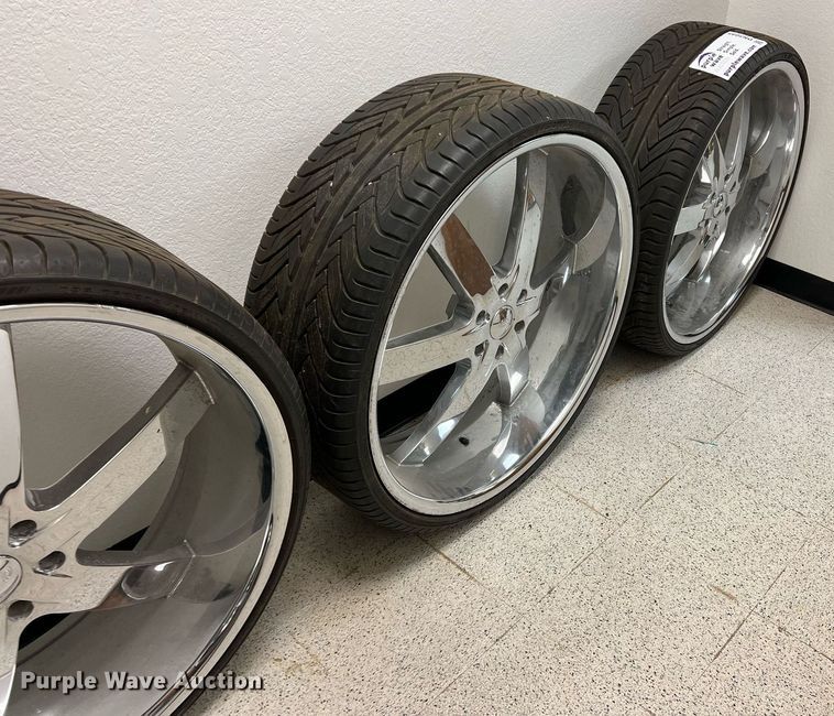 image for item DN3045 (4) 295/25ZR28 tires and wheels