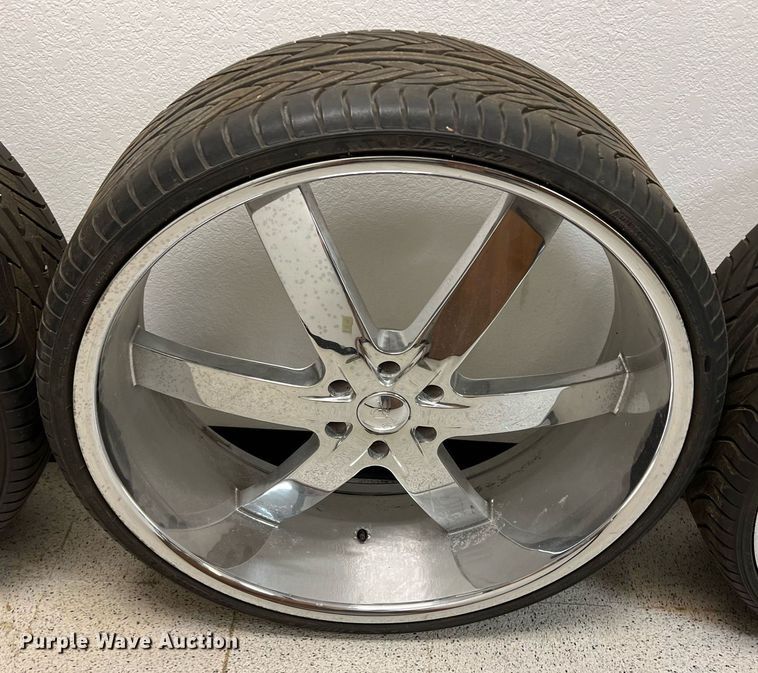 image for item DN3045 (4) 295/25ZR28 tires and wheels