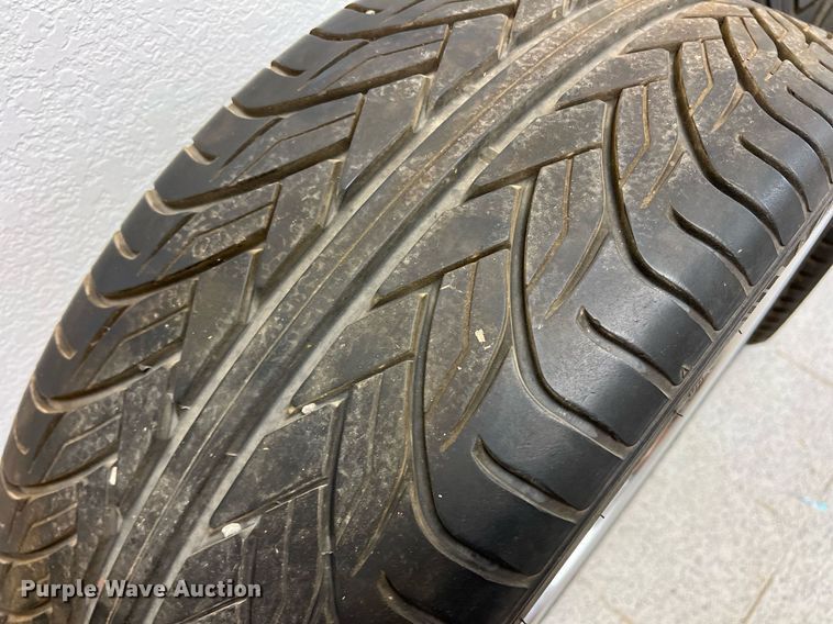 image for item DN3045 (4) 295/25ZR28 tires and wheels