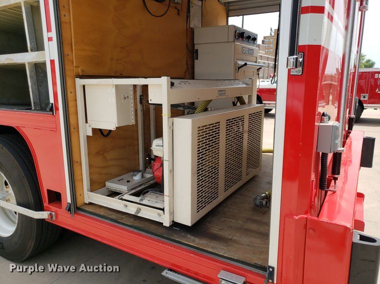 image for item IP9334 1999 Freightliner FL70  rescue vehicle