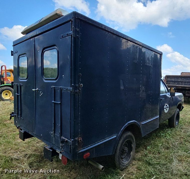 image for item LW9725 1977 Dodge W20  utility bed pickup truck