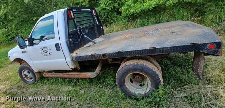 image for item LW9729 1999 Ford F350 Super Duty  flatbed pickup truck