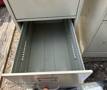 image for item NE9001 (2) four drawer filing cabinets