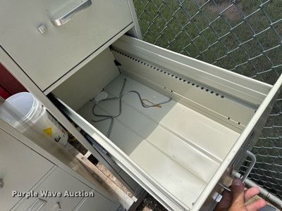 image for item NE9001 (2) four drawer filing cabinets