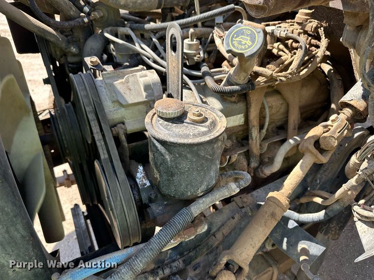 image for item NE9022 1995 Ford F700  dump flatbed truck