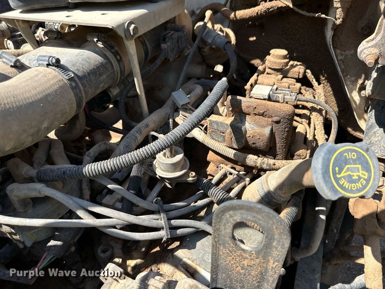 image for item NE9022 1995 Ford F700  dump flatbed truck