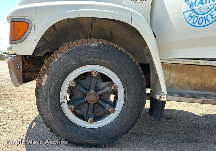 image for item NE9022 1995 Ford F700  dump flatbed truck