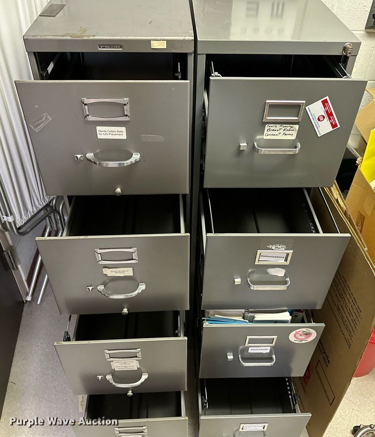 image for item OC9052 (5) four drawer file cabinets