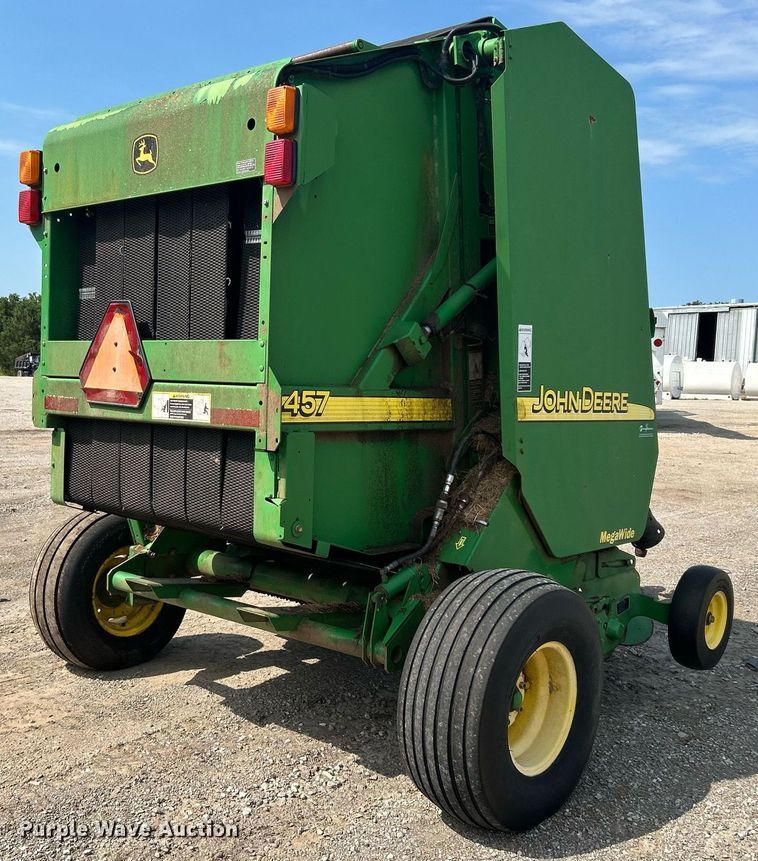 image for item DI7884 2004 John Deere 457 Mega Wide  round baler
