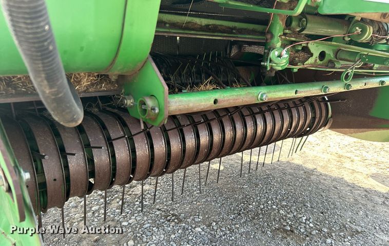 image for item DI7884 2004 John Deere 457 Mega Wide  round baler