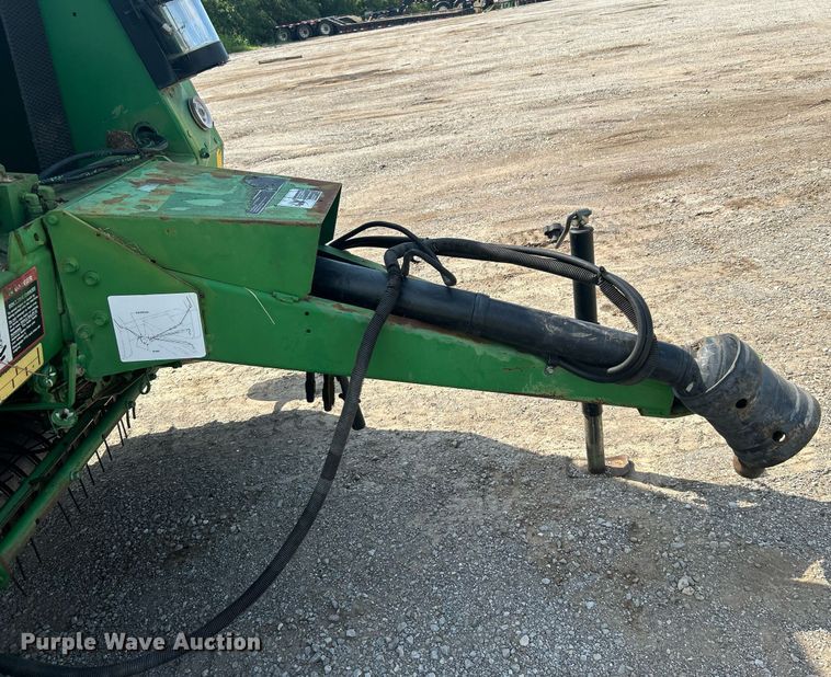 image for item DI7884 2004 John Deere 457 Mega Wide  round baler