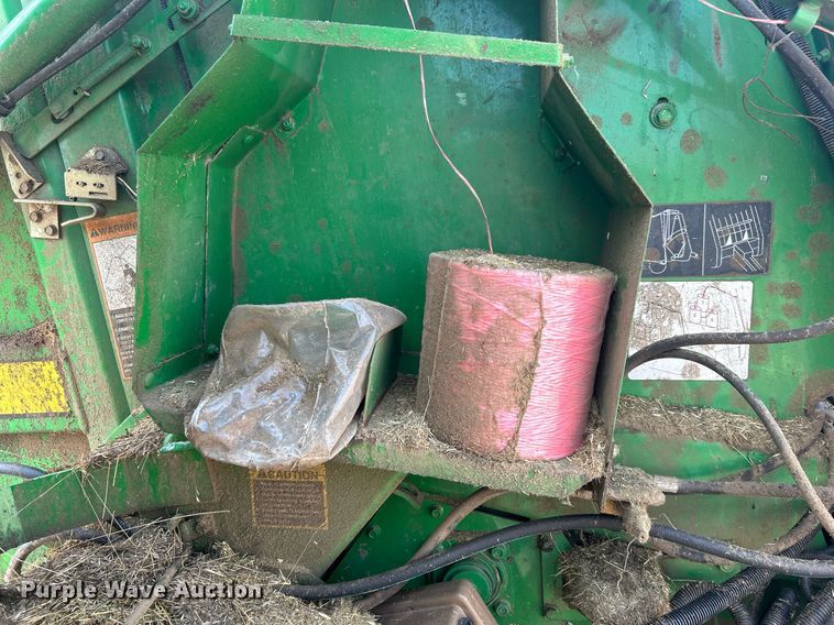 image for item DI7884 2004 John Deere 457 Mega Wide  round baler