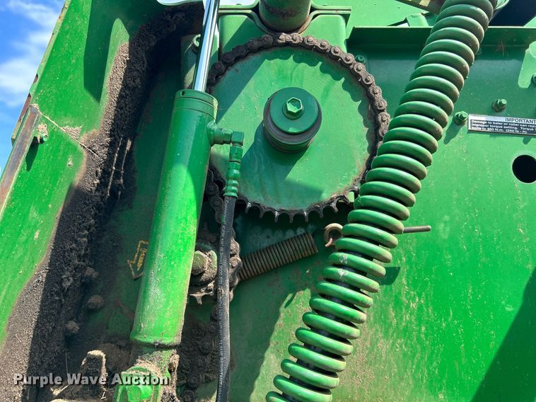 image for item DI7884 2004 John Deere 457 Mega Wide  round baler