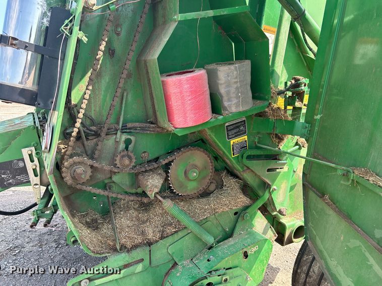 image for item DI7884 2004 John Deere 457 Mega Wide  round baler