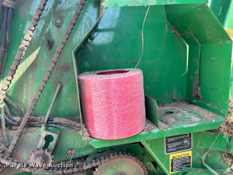 image for item DI7884 2004 John Deere 457 Mega Wide  round baler