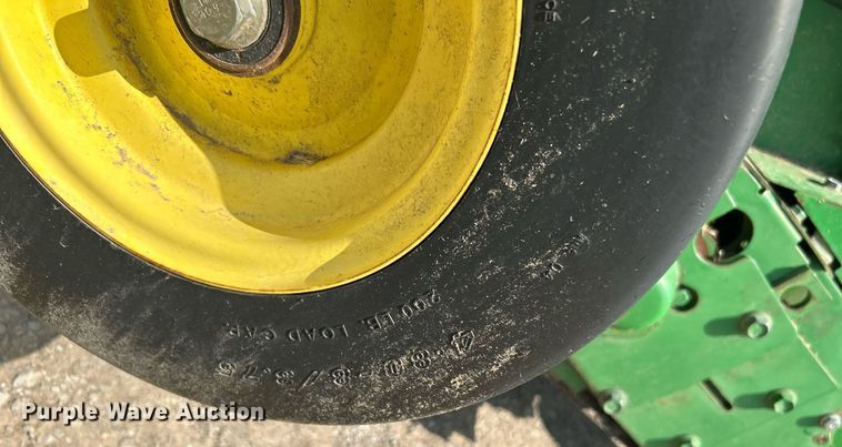 image for item DI7884 2004 John Deere 457 Mega Wide  round baler