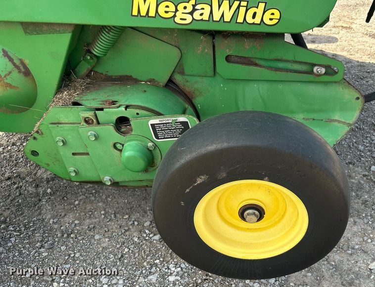 image for item DI7884 2004 John Deere 457 Mega Wide  round baler