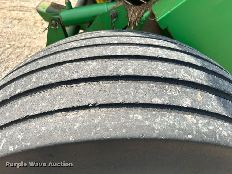 image for item DI7884 2004 John Deere 457 Mega Wide  round baler