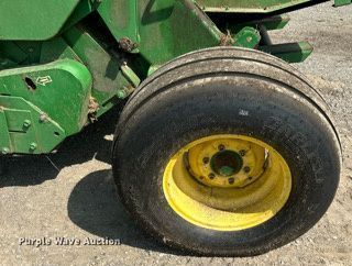 image for item DI7884 2004 John Deere 457 Mega Wide  round baler