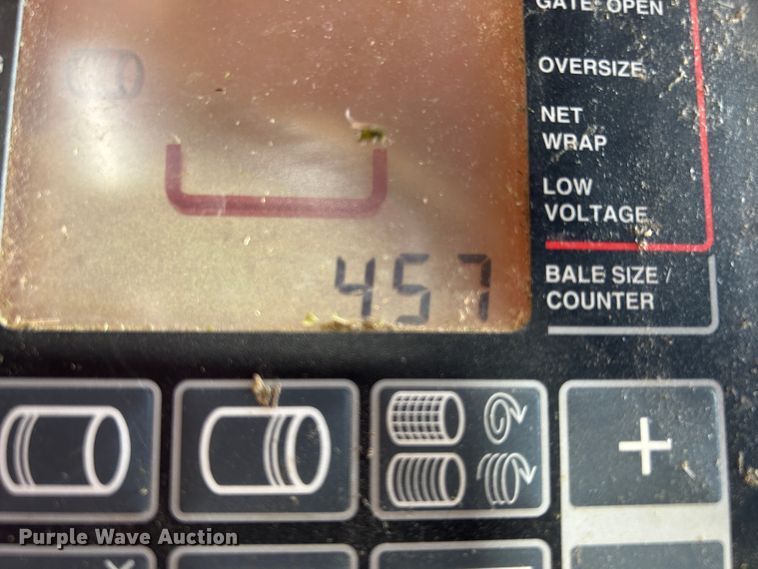 image for item DI7884 2004 John Deere 457 Mega Wide  round baler