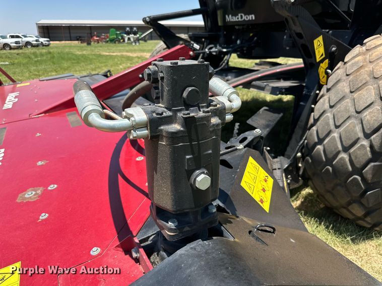 image for item DN4670 2021 MacDon M1240  swather / windrower