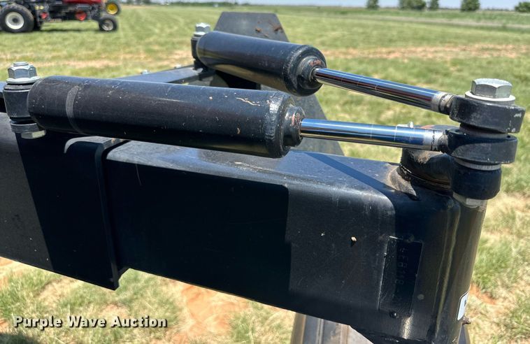 image for item DN4670 2021 MacDon M1240  swather / windrower