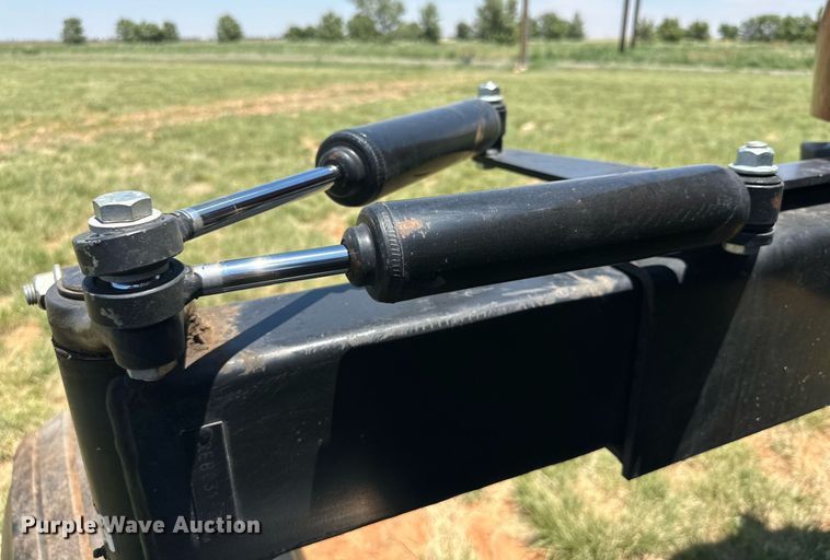 image for item DN4670 2021 MacDon M1240  swather / windrower