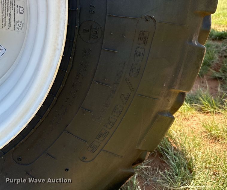 image for item DN4670 2021 MacDon M1240  swather / windrower