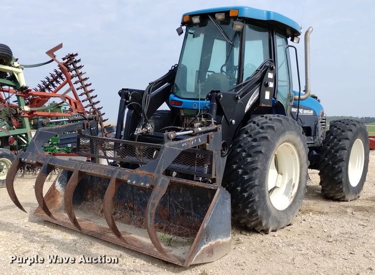 image for item DP3301 2001 New Holland TV140  bi-directional tractor