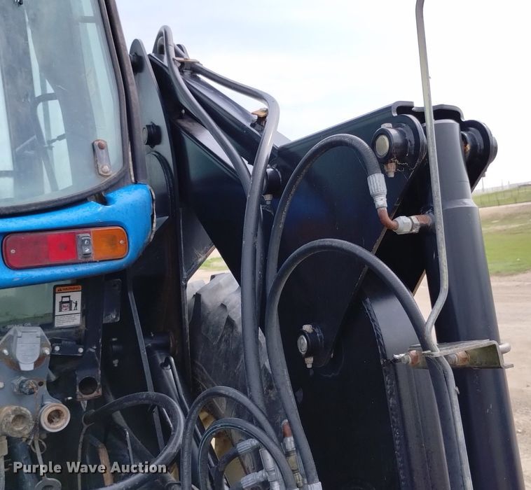 image for item DP3301 2001 New Holland TV140  bi-directional tractor