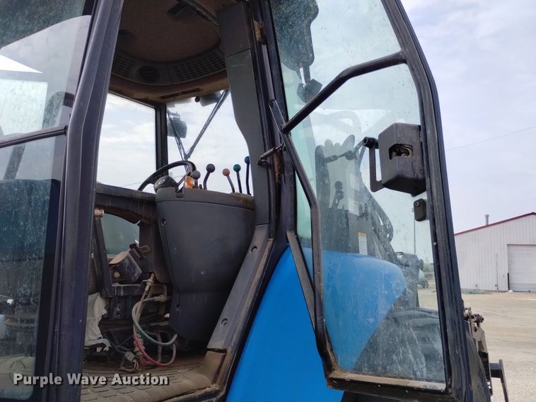 image for item DP3301 2001 New Holland TV140  bi-directional tractor