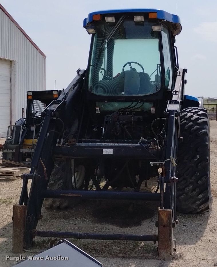 image for item DP3304 1998 New Holland TV140  bi-directional tractor