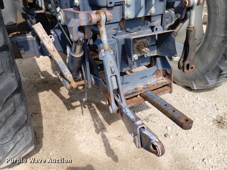 image for item DP3304 1998 New Holland TV140  bi-directional tractor