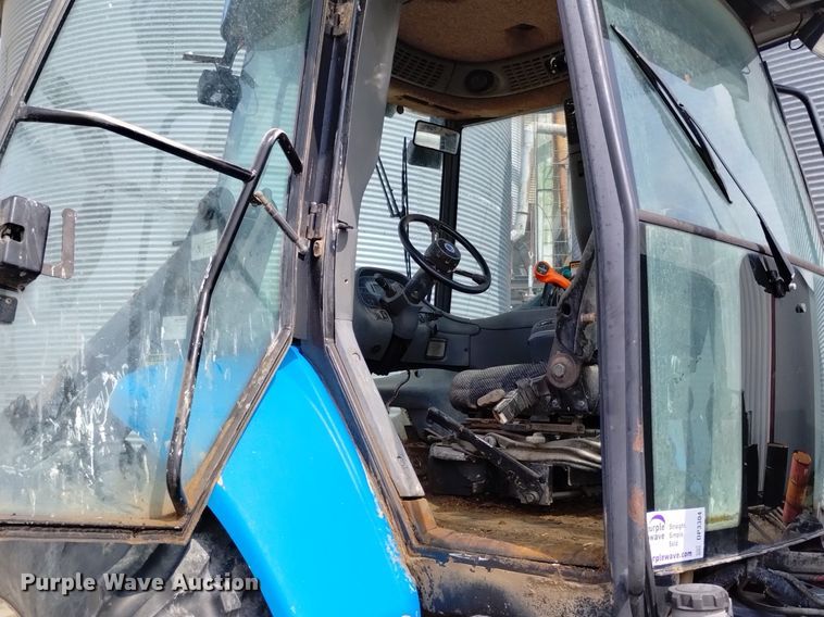 image for item DP3304 1998 New Holland TV140  bi-directional tractor