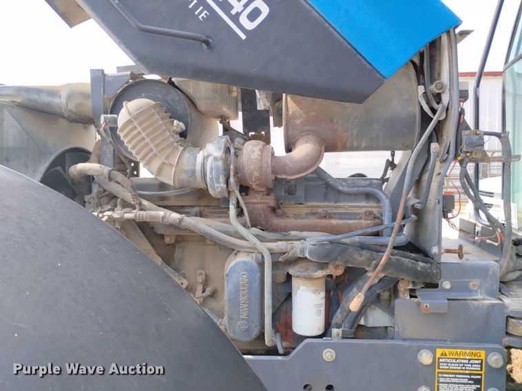 image for item DP3304 1998 New Holland TV140  bi-directional tractor