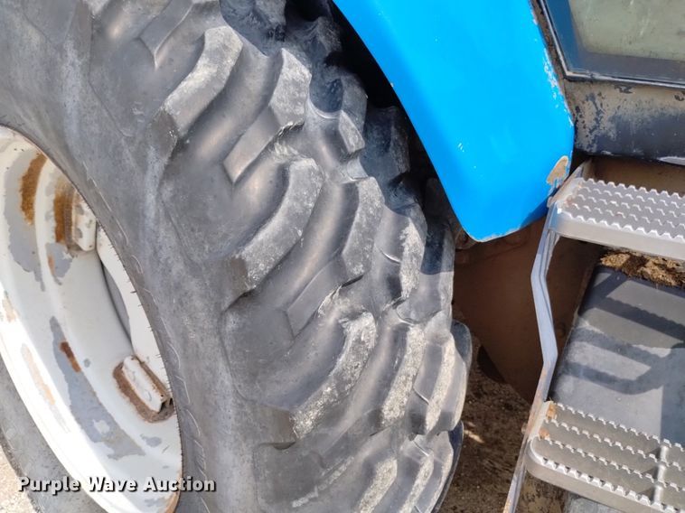 image for item DP3304 1998 New Holland TV140  bi-directional tractor