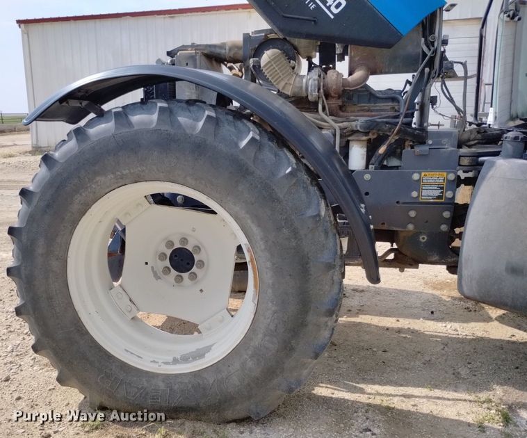 image for item DP3304 1998 New Holland TV140  bi-directional tractor