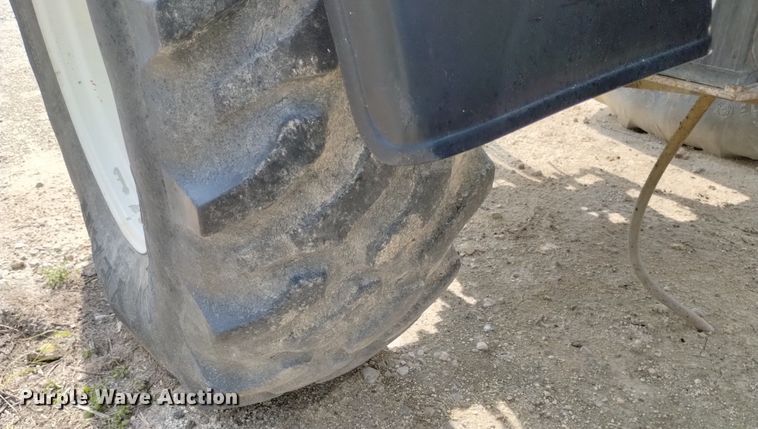 image for item DP3304 1998 New Holland TV140  bi-directional tractor