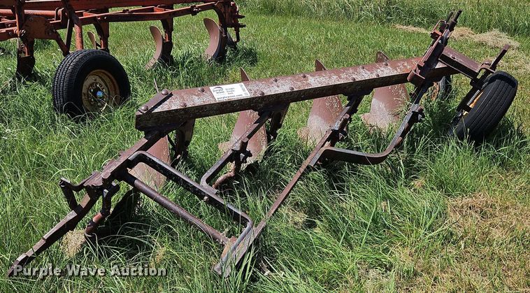 image for item DQ1762 McCormick  four bottom plow